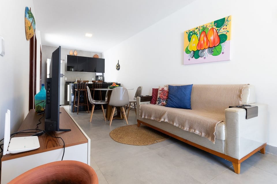 Comfort Apartment | Living area | 40-inch Smart TV with digital channels