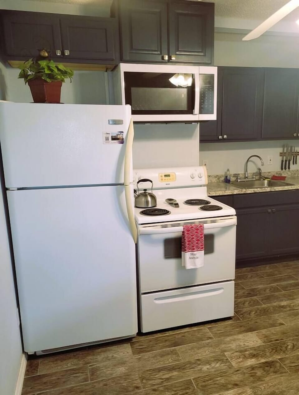 Kitchen stocked with essentials and cookware