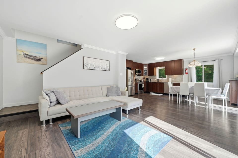 An open layout built for gathering. Cook, dine, and hang out in one shared space that keeps everyone connected from breakfast until bedtime. It is the ultimate hub for your group vacation.