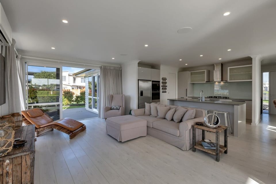 Bright, spacious living room and kitchen setup. Ideal for relaxing together.