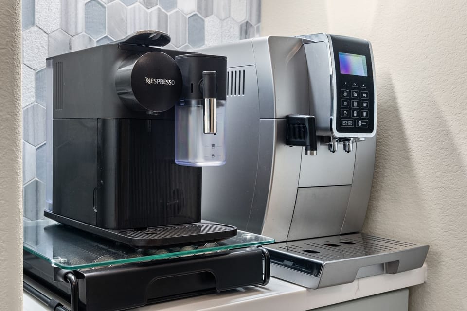 Whether you're an espresso lover or a latte enthusiast, our coffee station has you covered. Enjoy a Nespresso machine, DeLonghi automatic coffee machine, and freshly ground coffee beans to start your day.
