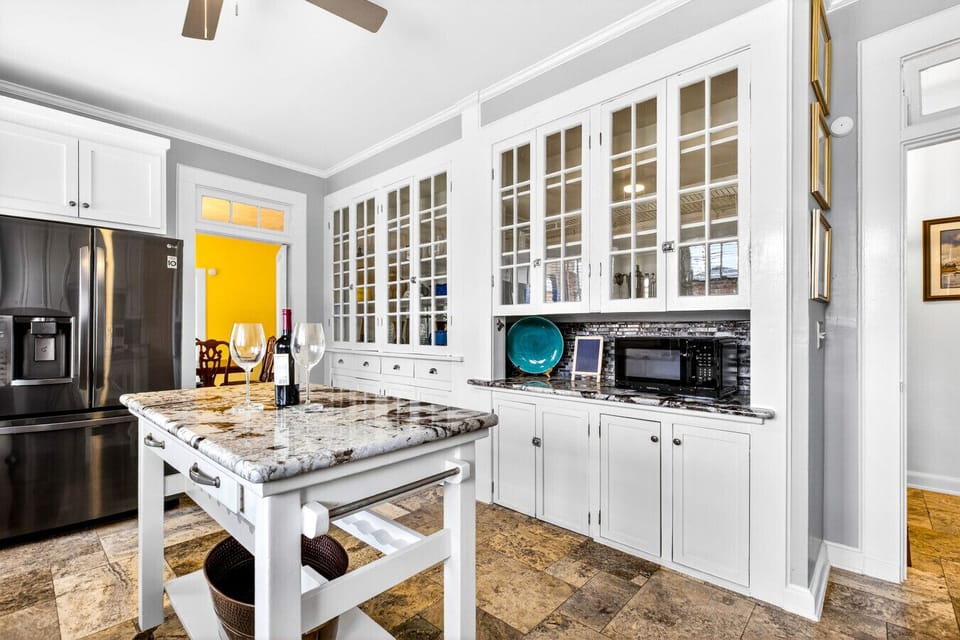 Kitchen | Granite Countertops | Glass-Front Cabinets & Pantry Storage