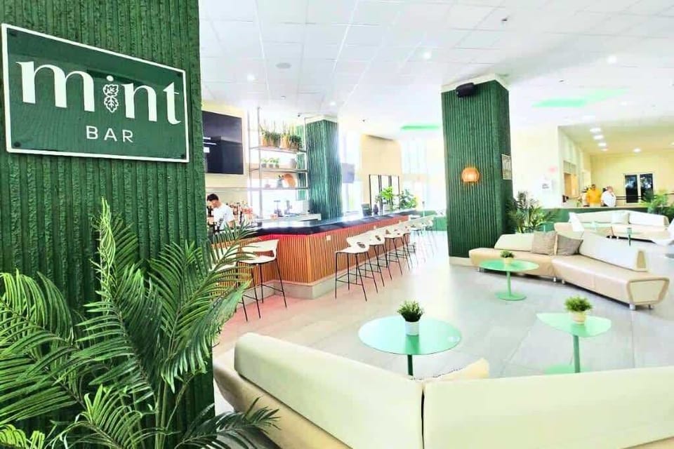 Stylish Mint Bar featuring modern décor, cozy seating, and a vibrant atmosphere—perfect for unwinding with a refreshing cocktail after a day at the beach.