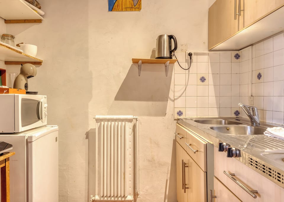 Kitchenette avec éléctroménager à dispostion