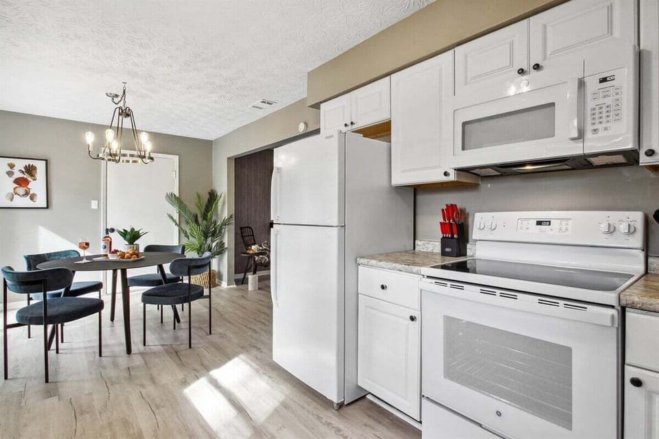 Whip up something delicious in the kitchen while enjoying full views of the dining area and the backyard—so you're never far from the fun.