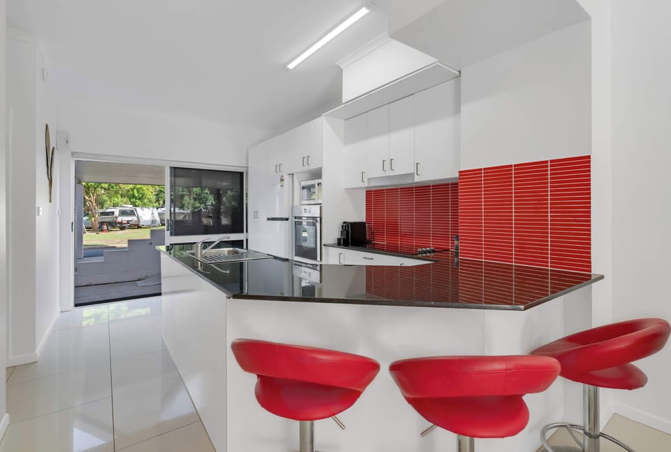 Pull up a seat at the breakfast bar and stools for a coffee before heading to Four Mile Beach or returning home with fresh local produce for lunch.