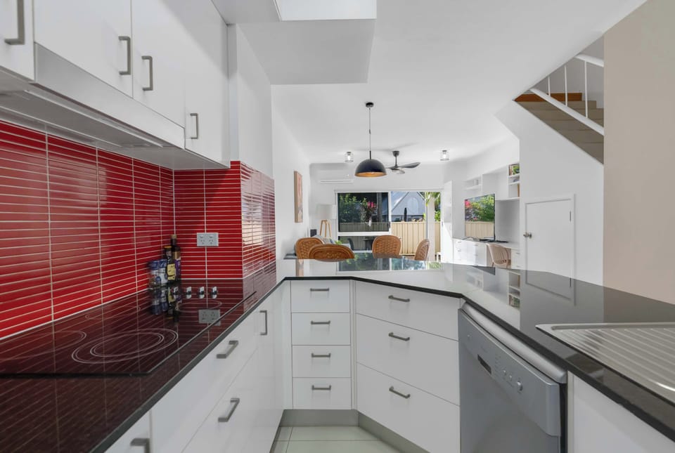 Prepare everything from quick breakfasts to evening meals in the kitchen appliances area, where generous bench space and essentials support easy holiday dining.
