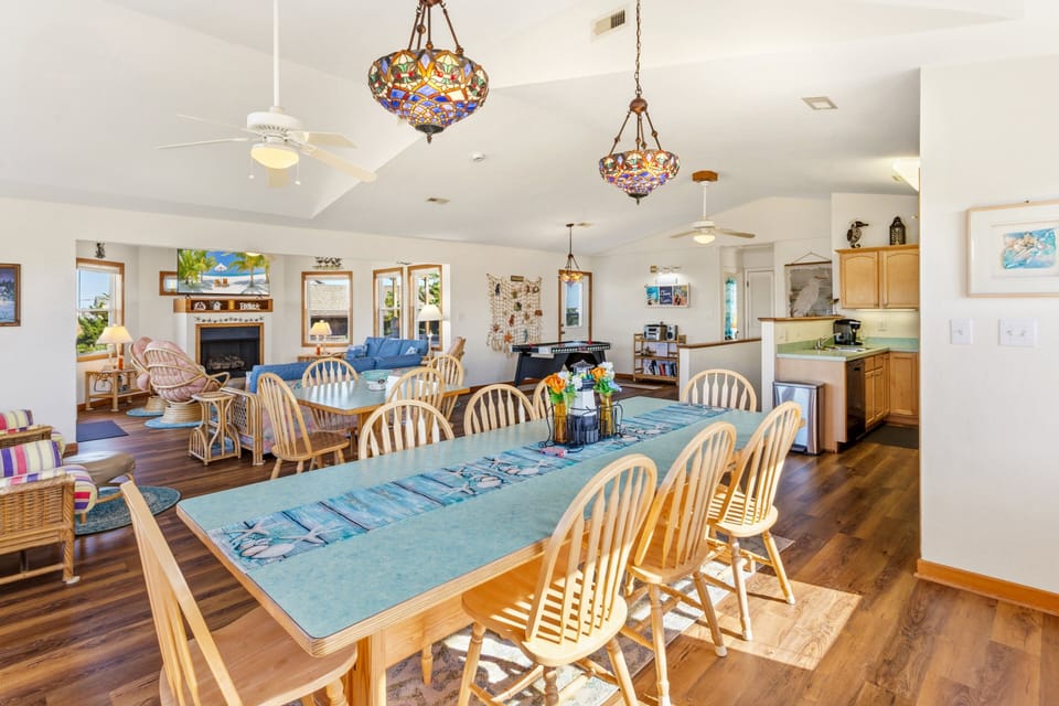Gather around two dining tables with seating for 12, perfect for family meals, game nights, and special celebrations.