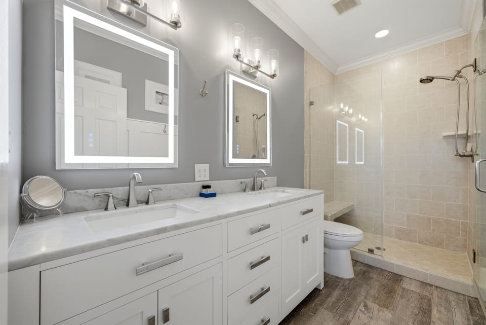 The master bathroom is complete with a large double vanity and walk-in shower.