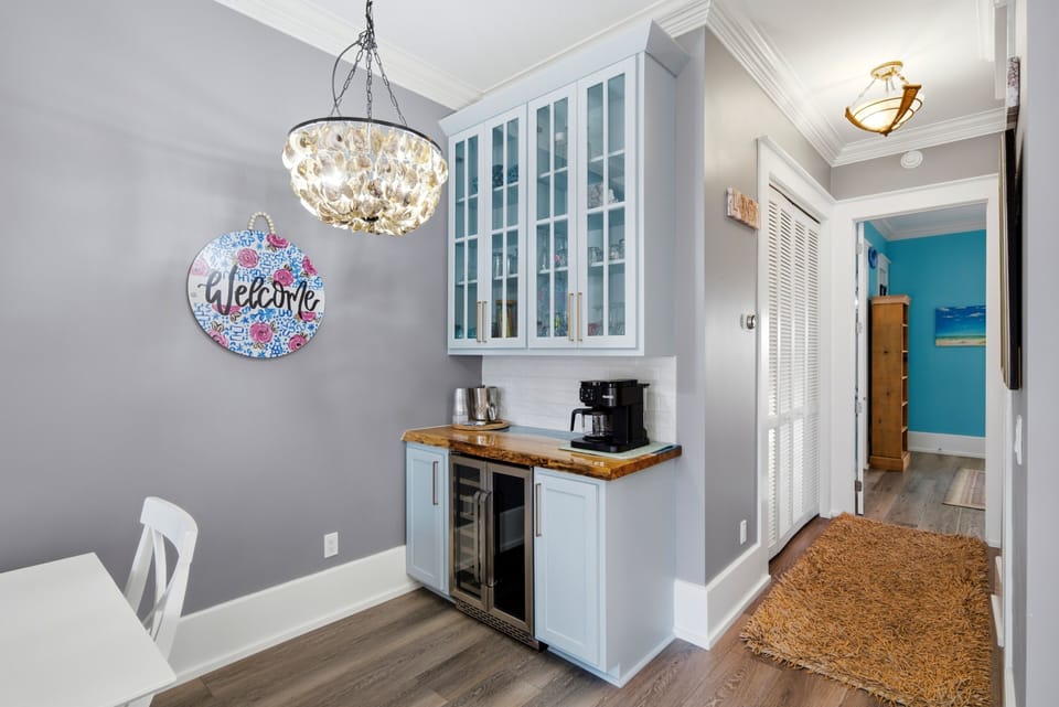 The dining room has a wonderful beverage station fully equipped with a wine refrigerator and coffee bar