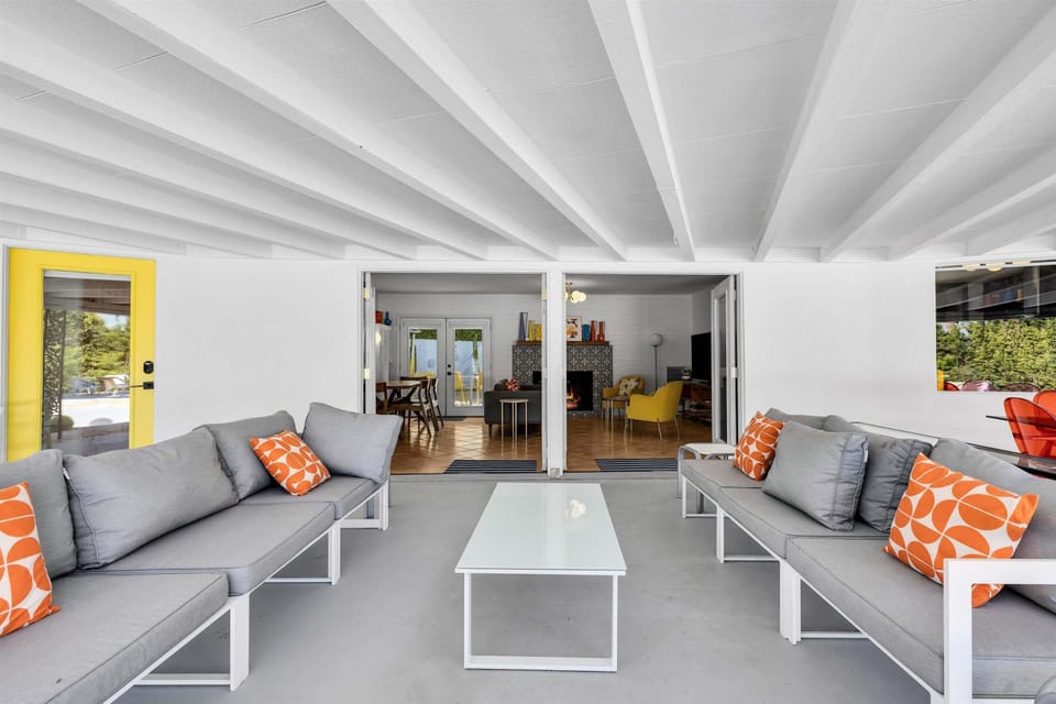 Covered outdoor lounge for year-round relaxation