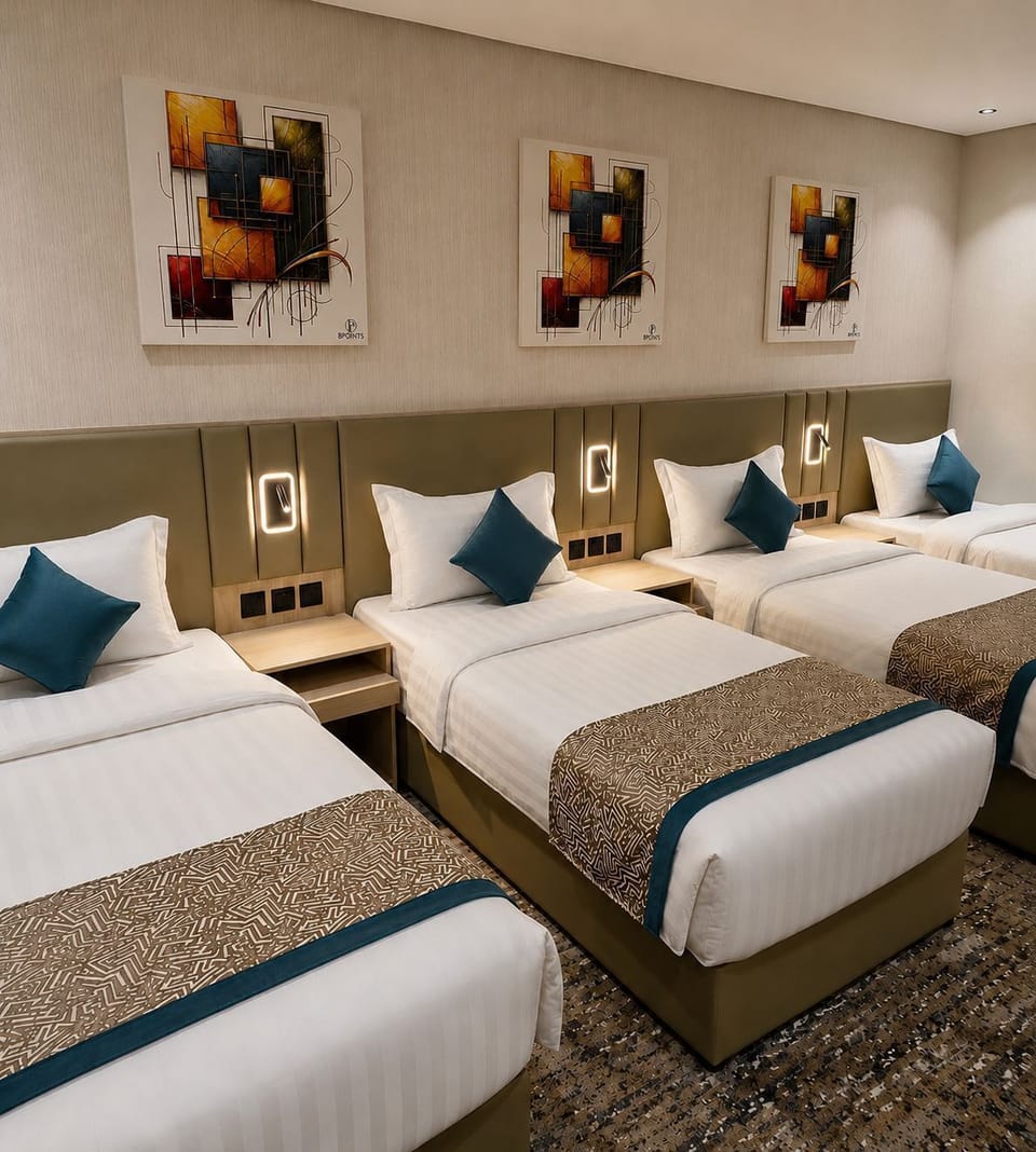 Quadruple Room | In-room safe, blackout drapes, iron/ironing board (on request)