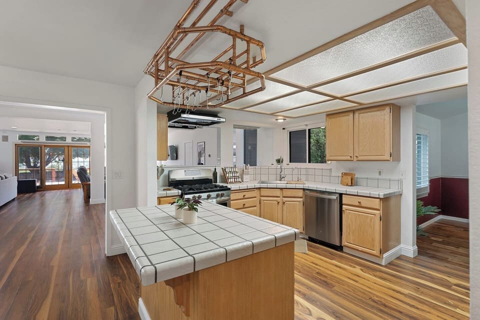 Whether you`re preparing a holiday feast or enjoying your morning coffee, this spacious kitchen offers the perfect blend of functionality, comfort, and gathering space.