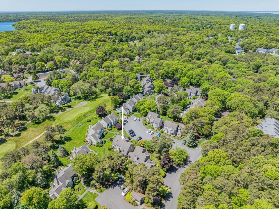 Aerial view of the property showcasing its prime location within the beautiful Villages at Ocean Edge