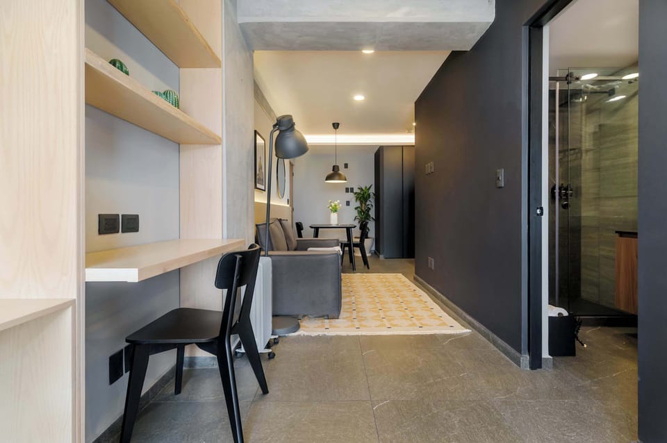 Functional workspace conveniently located near the entrance and kitchen.