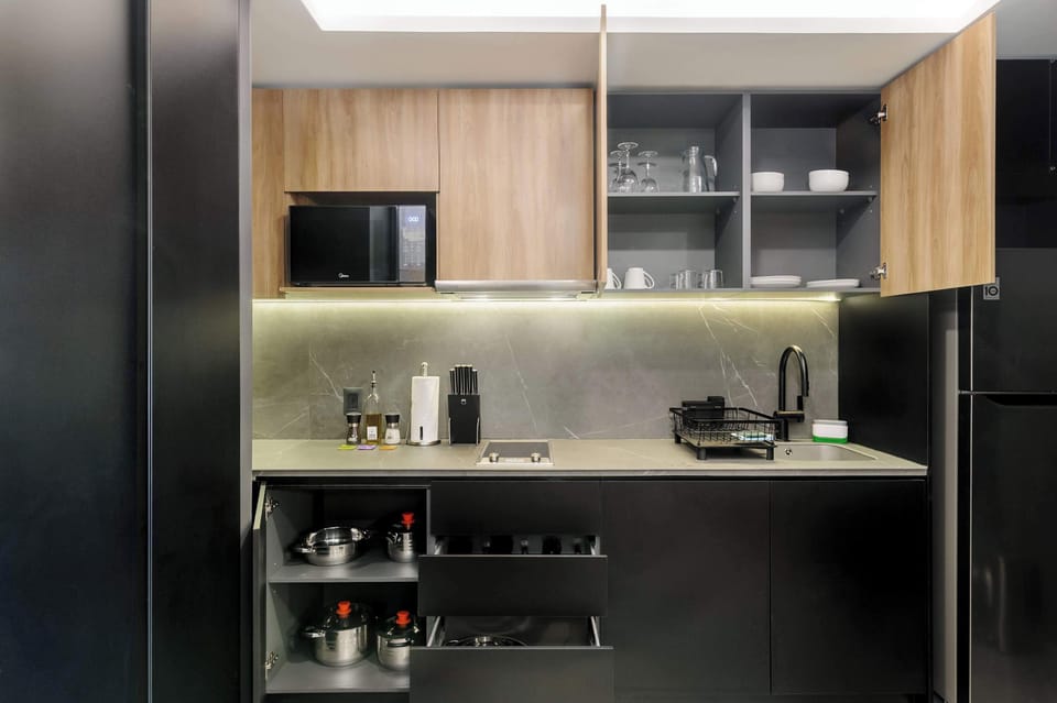 Well-equipped kitchen with ample storage, modern appliances, and cooking essentials.