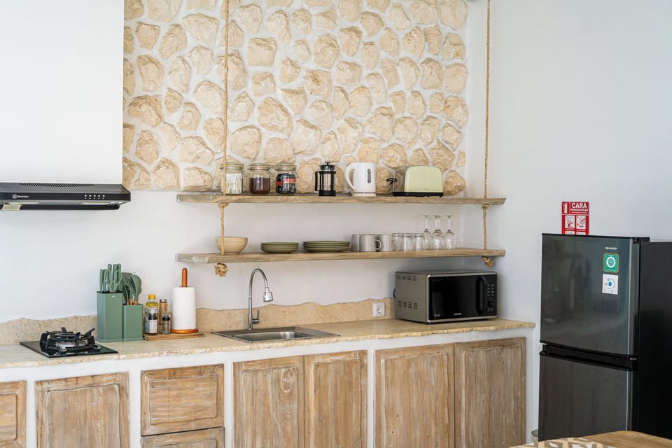 Villa, 2 Bedrooms, Patio, Pool View | Private kitchen | Electric kettle, toaster, cleaning supplies, freezer