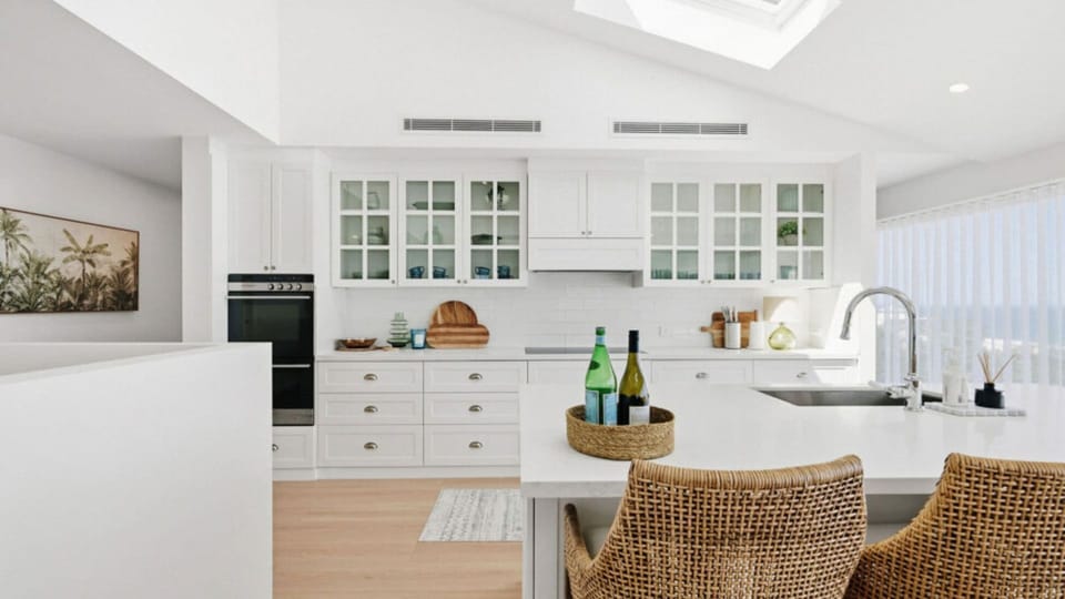 Stylish kitchen with island seating for family meals.