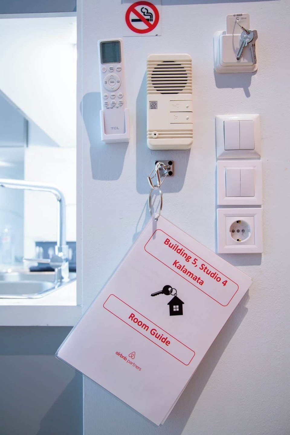 Guest information is available inside the studio, with practical details for a smooth and safe stay.