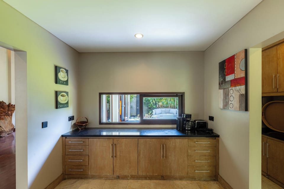 Villa | Private kitchen | Espresso maker, full-size fridge, microwave, oven
