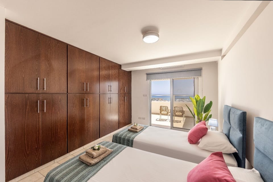 Twin Bedroom with Balcony