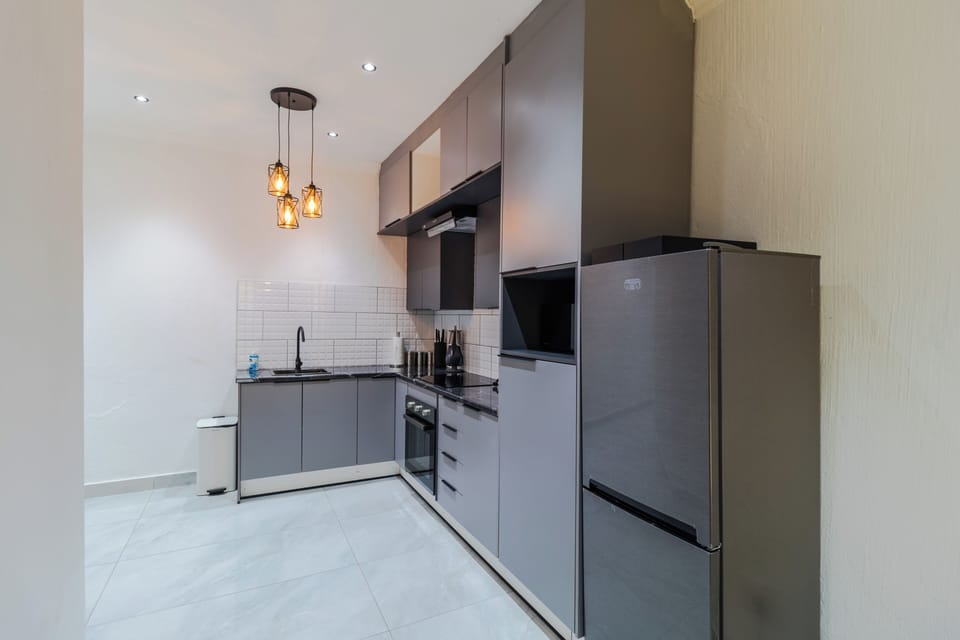 Mini-fridge, microwave, coffee grinder, mixer