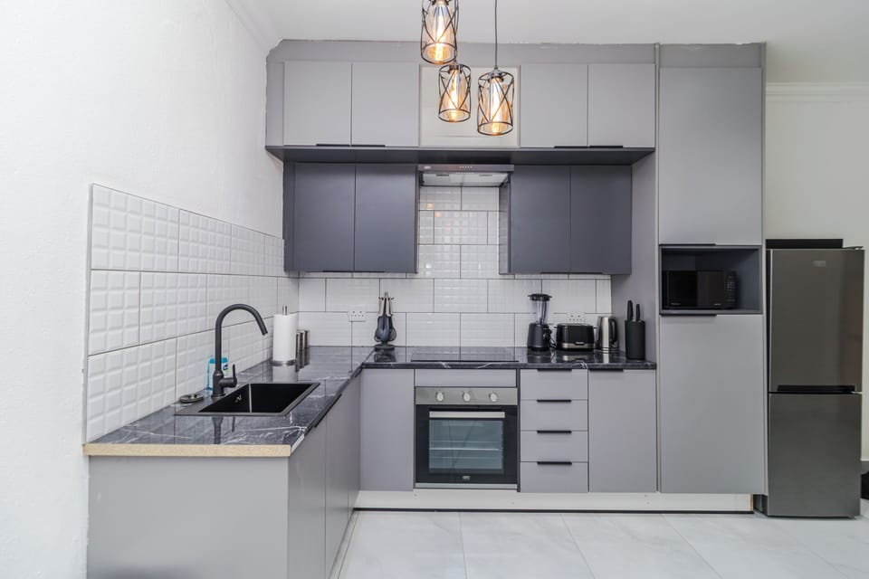 Mini-fridge, microwave, coffee grinder, mixer