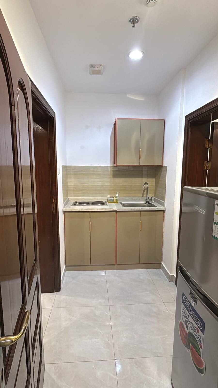 Family Room | Private kitchen | Mini-fridge, oven
