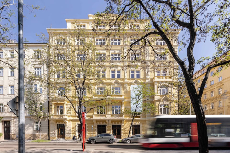 Tram stop is just before the building