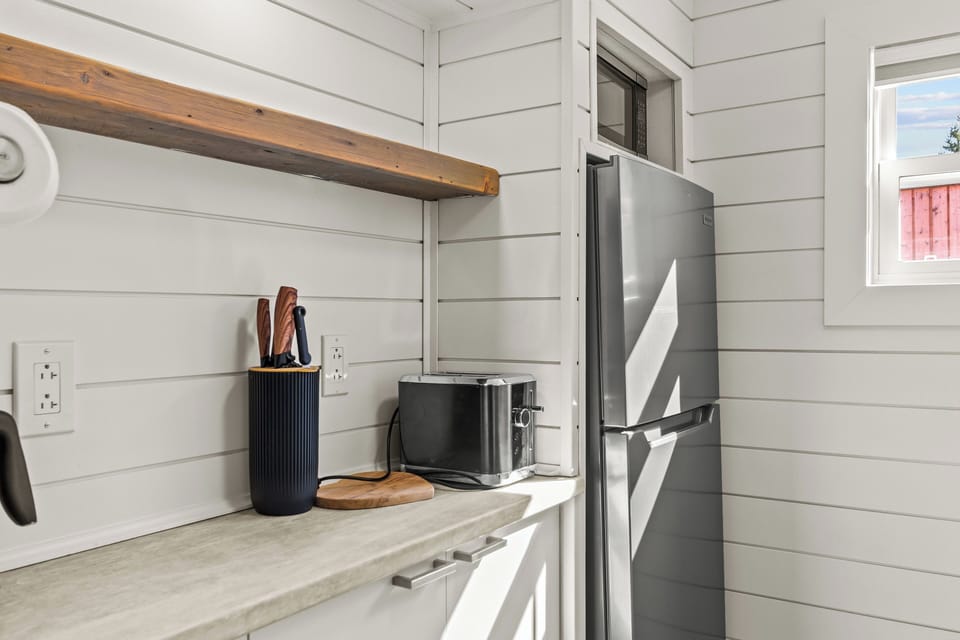 Kitchen stocked with essentials for comfortable longer stays.