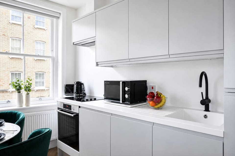 The kitchen is fully equipped to prepare a simple meal 