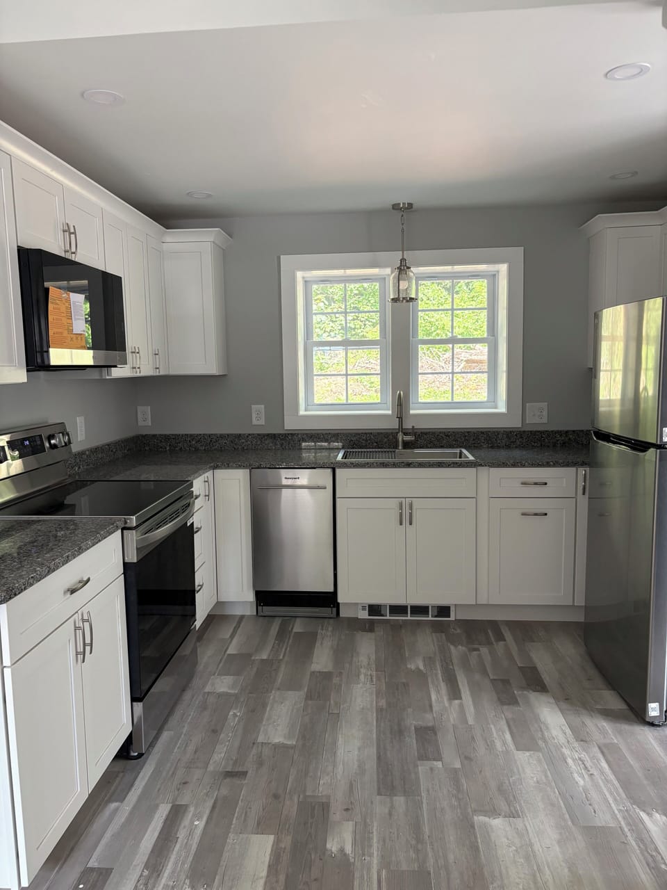 All new kitchen cabinets, stainless appliances, granite countertops