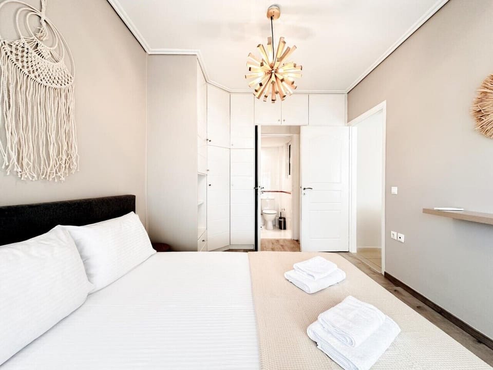 Double bedroom with statement lighting and ample wardrobe space