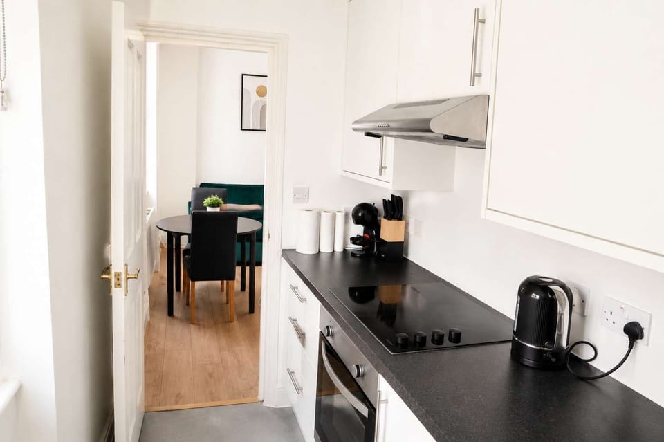 The kitchen is fully equipped to prepare a simple meal 