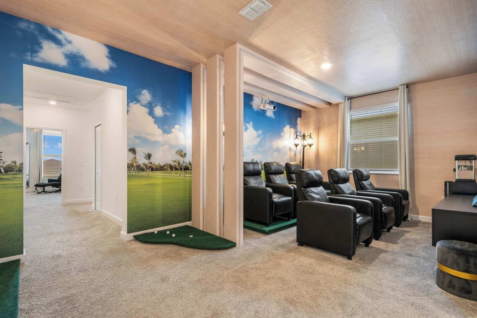 Bring everyone together for the ultimate entertainment experience. This inviting home theater offers comfortable seating and the perfect setting for movie nights, family bonding, and laughter-filled evenings with friends.