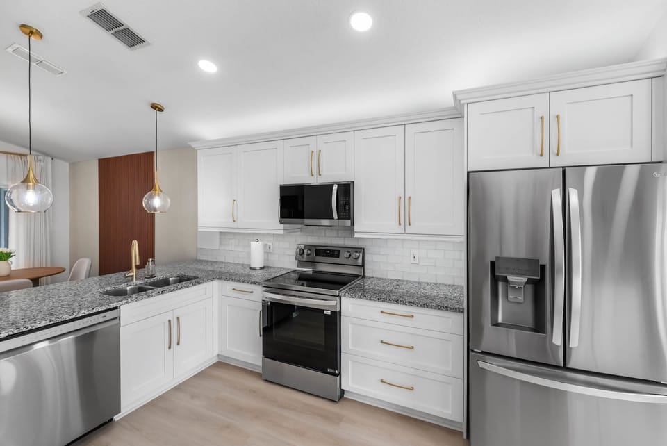 Everything you need for easy entertaining is ready and waiting in the well-appointed kitchen. It is a functional and friendly space where you can slow down and enjoy the company of your loved ones while you cook.