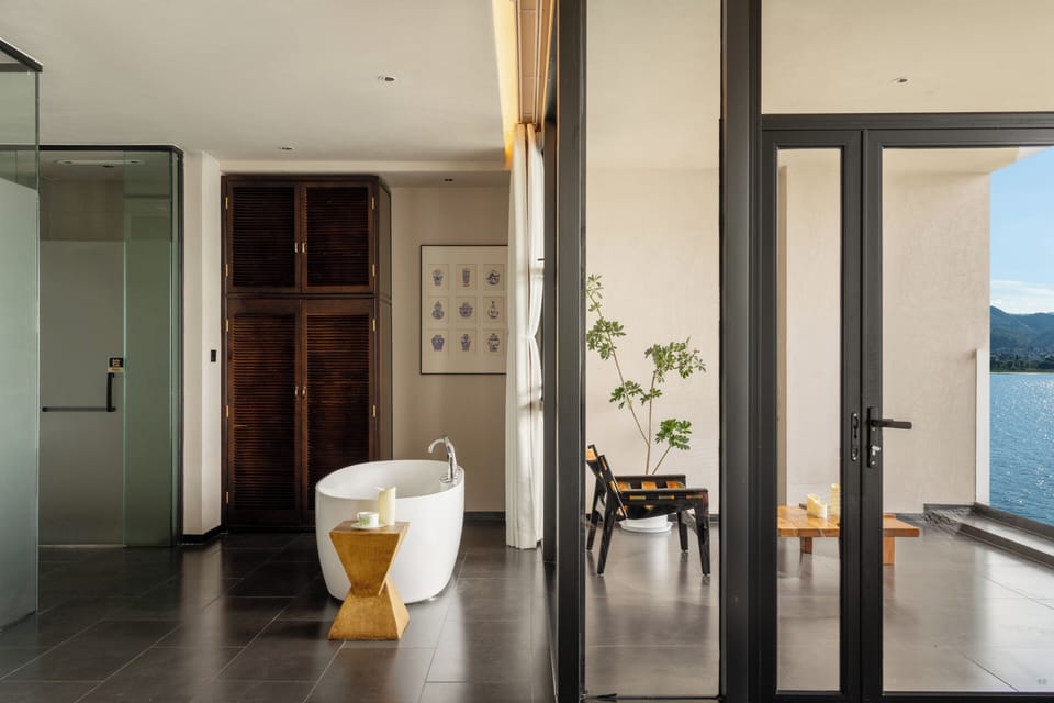 Exclusive Double Room, Patio, Sea View | Bathroom | Separate tub and shower, hair dryer, slippers, towels