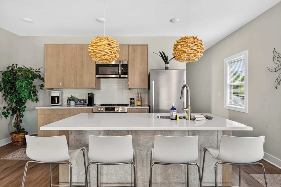 Kitchen — Unit 2: Everything you need, plus the outlets and counter space you'd never expect. Coffee bar included.