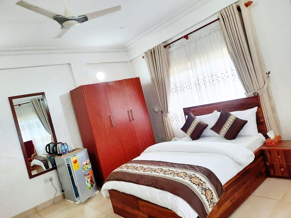Standard Double Room, Balcony, Garden View | In-room safe, desk, laptop workspace, blackout drapes
