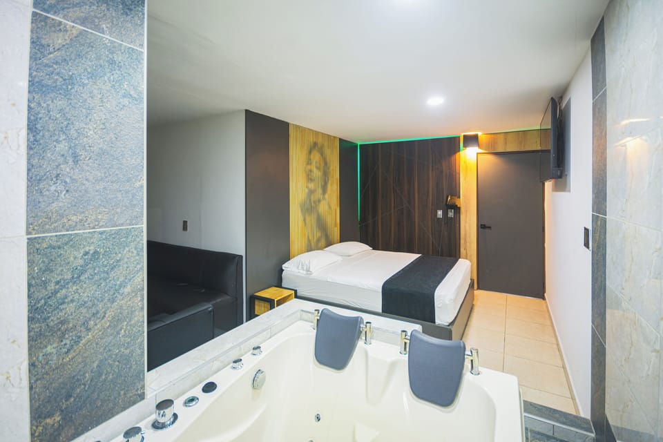 Deluxe Suite, Balcony, City View | Minibar, free WiFi, bed sheets