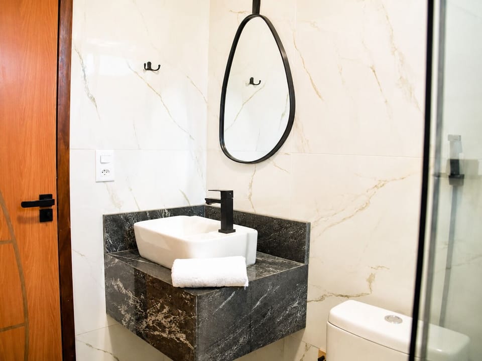Triple Room | Bathroom | Shower, free toiletries, towels, soap