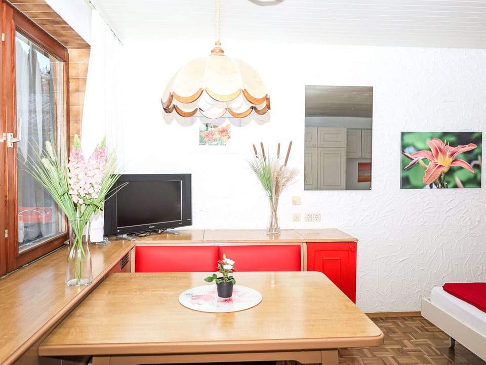 Furniture, Interior Design, Wood, Flooring, Room, Table, Lighting, Floor, Light Fixture, Ceiling