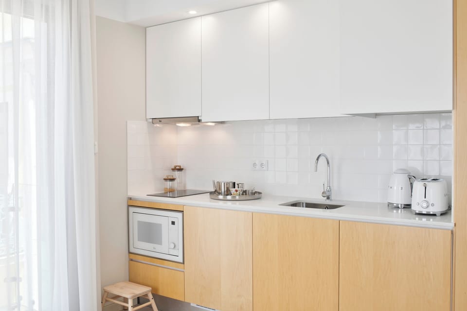 Premium Studio, Canal View | Private kitchen | Full-size fridge, microwave, stovetop, cookware/dishes/utensils