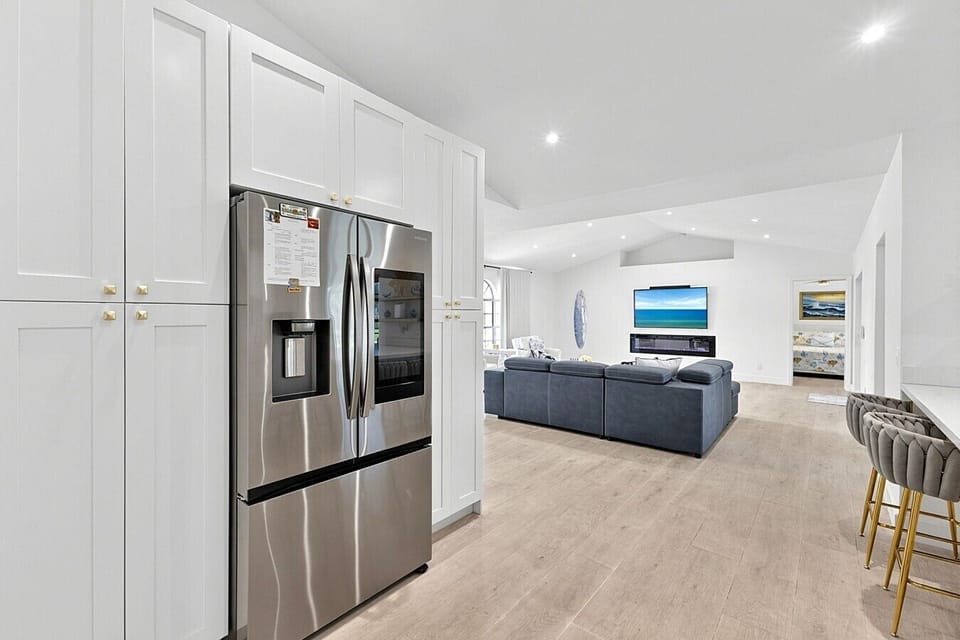 Kitchen | Full-Size Refrigerator | Open Layout to Living Room