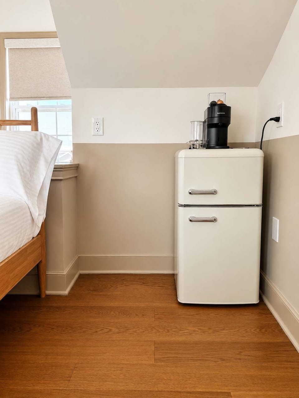 Enjoy the convenience of an in-room coffee station and retro-style mini fridge, perfect for your morning coffee or keeping refreshments close at hand.