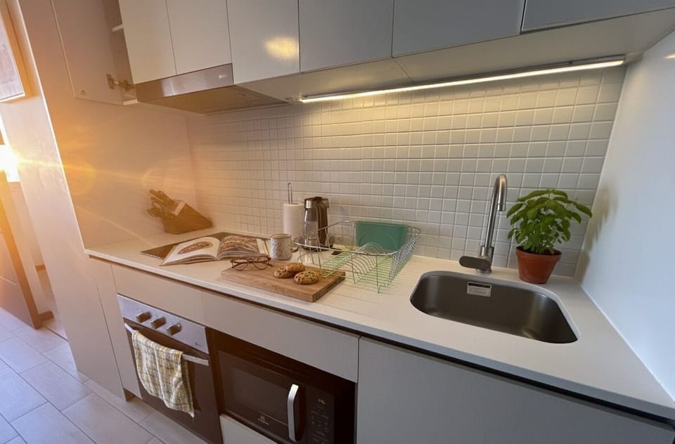 Apartment | Private kitchen | Full-size fridge, microwave, oven, cookware/dishes/utensils