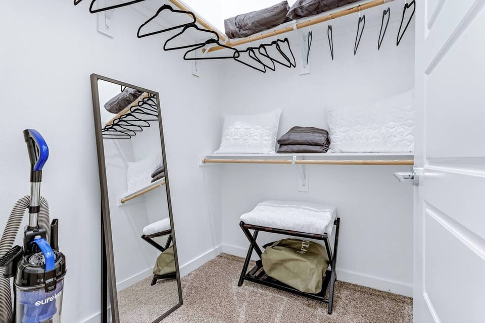 Extra blankets, pillows Luggage rack, hangers, ironing board and iron to help while you travel.