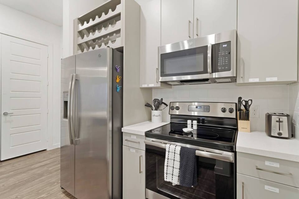 Stove, Oven, Microwave, Kitchen utensils, knives, toaster, salt and pepper available for a delicious home cooked meal or delivery.