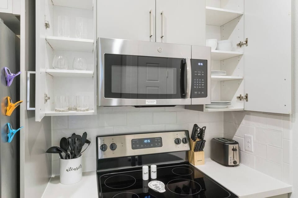 High quality cups, wine glasses, plates, bowls, knives and eating and cooking utensils provided.