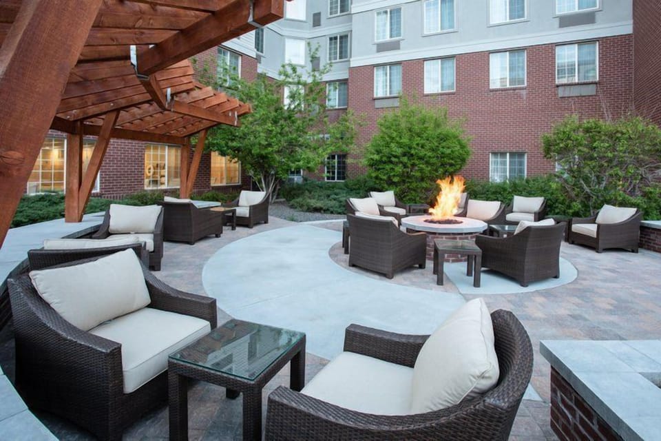 Outdoor fire pit area with seating for evening gatherings.